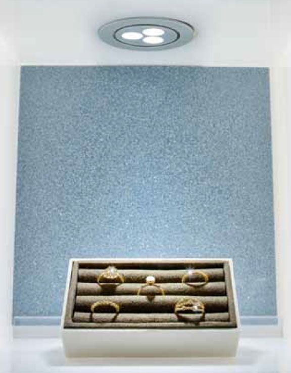 Hera's HO-LED used to display jewelry. The HO-LED light has a tilt feature, so you can pinpoint the light better on your display items, artw